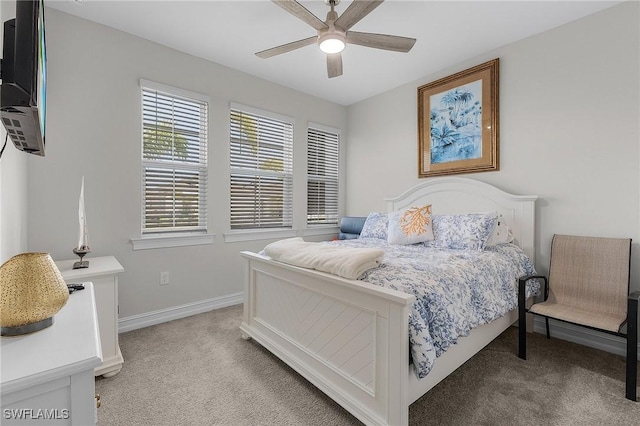 bedroom with light carpet and ceiling fan