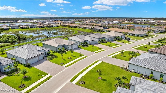 bird's eye view with a water view