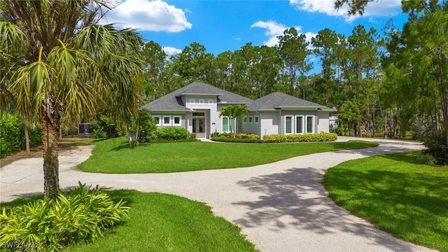 view of front of home with a front yard