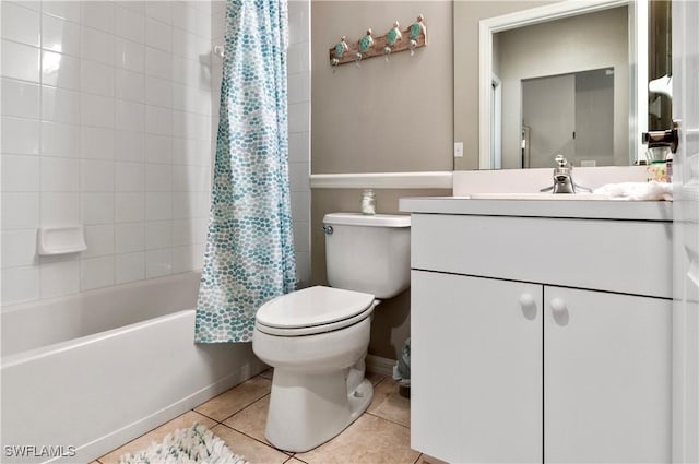 full bathroom with shower / bath combo, vanity, tile patterned floors, and toilet