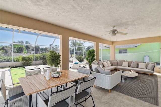 sunroom / solarium with ceiling fan