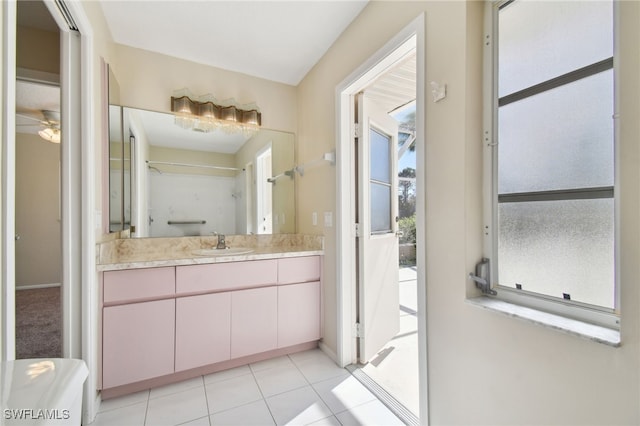 bathroom with vanity and tile patterned flooring