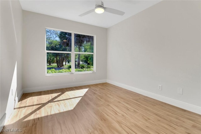 unfurnished room with light hardwood / wood-style flooring and ceiling fan