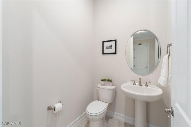 bathroom with sink and toilet