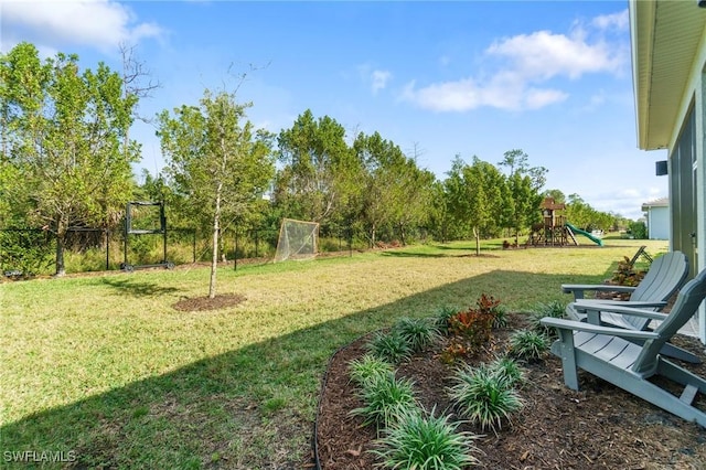 view of yard featuring a playground