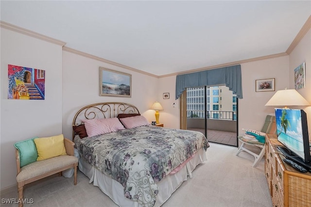 carpeted bedroom featuring ornamental molding and access to outside