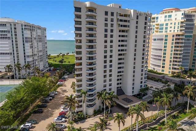 view of building exterior featuring a water view