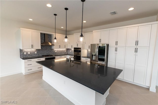 20341 Fair Oak Ln, Estero, FL 33928 - kitchen featuring stainless steel appliances, wall chimney exhaust hood, dark countertops, light tile patterned floors, and backsplash