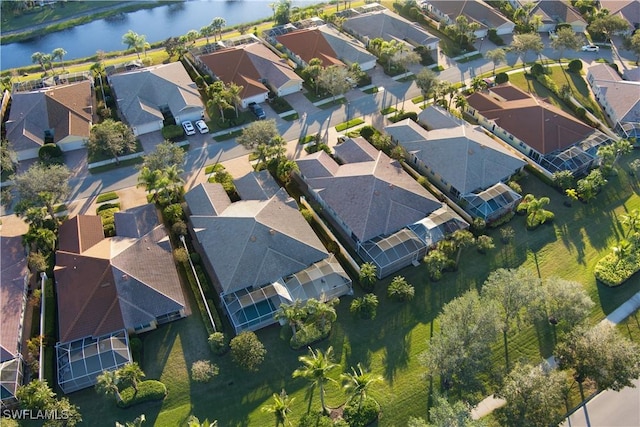 drone / aerial view with a water view