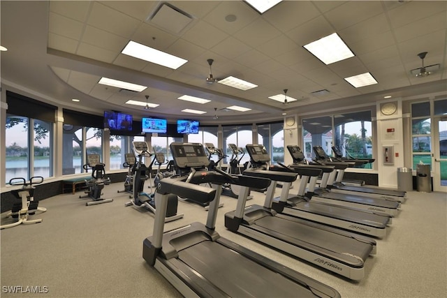 workout area featuring a paneled ceiling