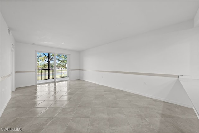 view of tiled spare room