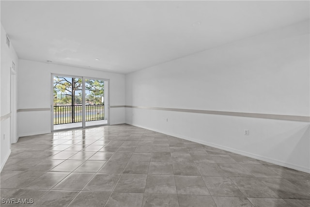 view of tiled empty room