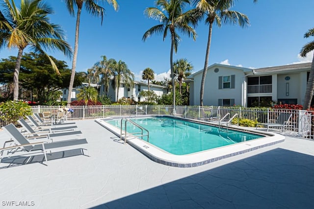 view of pool featuring a patio area