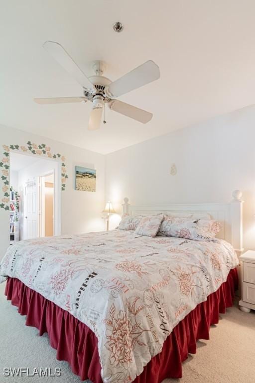 bedroom with ceiling fan and carpet