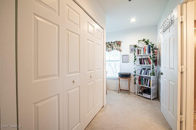 hallway with light carpet