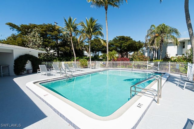 view of swimming pool featuring a patio