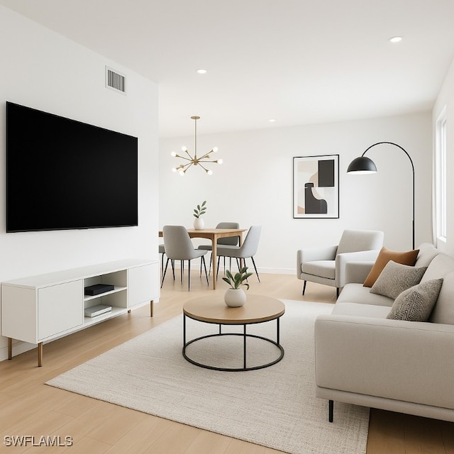 800 S Golf Dr Unit N205, Naples, FL 34102 - living room with a chandelier, wood finished floors, visible vents, and recessed lighting