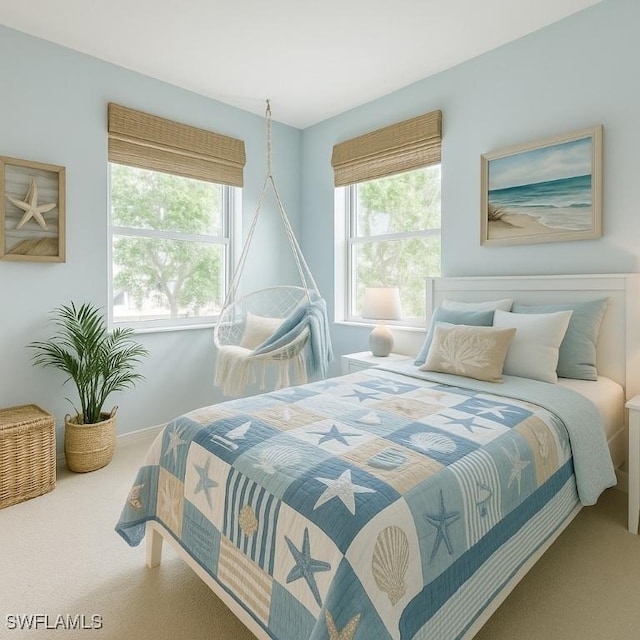 800 S Golf Dr Unit N205, Naples, FL 34102 - carpeted bedroom featuring baseboards and multiple windows