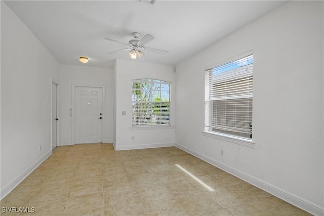 empty room with ceiling fan