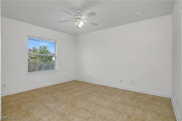 spare room featuring ceiling fan