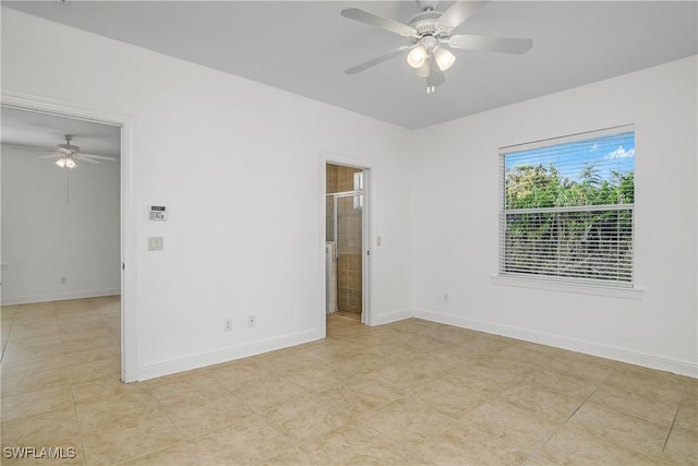 unfurnished room featuring ceiling fan