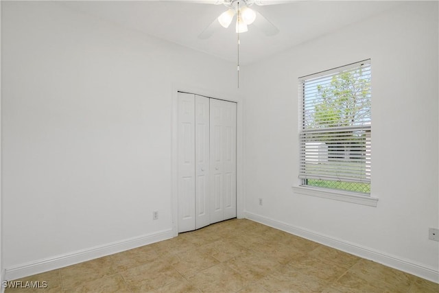 empty room featuring ceiling fan