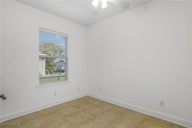 empty room featuring ceiling fan