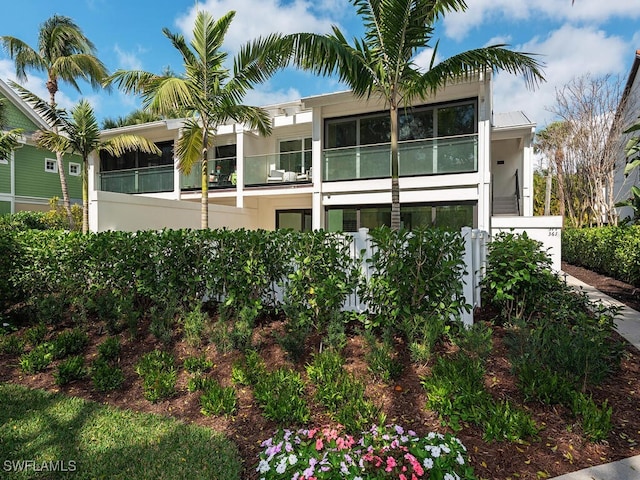 view of side of property with stucco siding