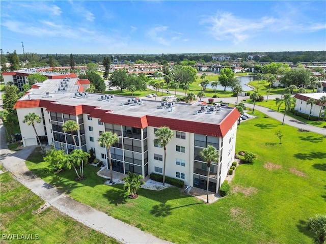 4372 27th Ct SW Unit 301, Naples, FL 34116 - bird's eye view of a large body of water and apartment complex