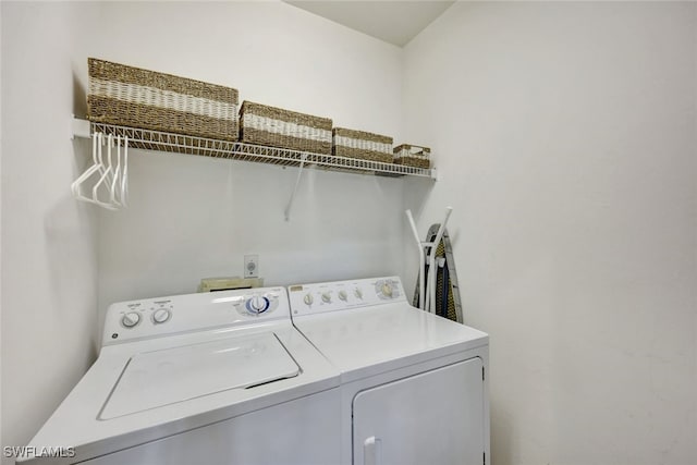 laundry room featuring independent washer and dryer