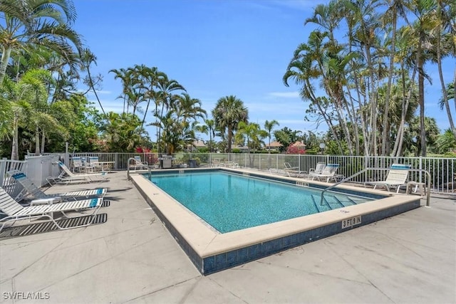 view of swimming pool featuring a patio