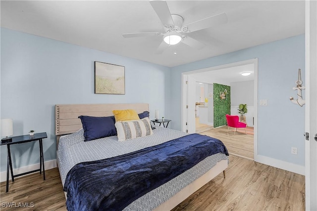 bedroom featuring ceiling fan and wood-type flooring