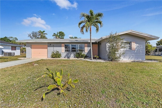 single story home featuring a garage, central AC unit, and a front lawn