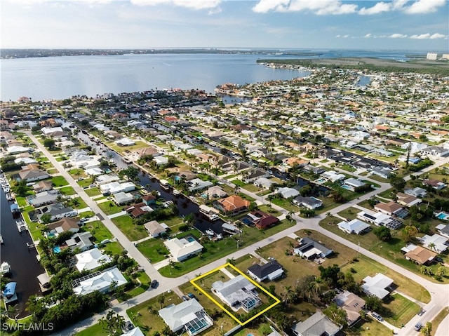 drone / aerial view featuring a water view