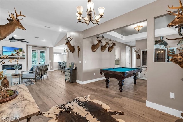 rec room with lofted ceiling, pool table, wood-type flooring, and ceiling fan