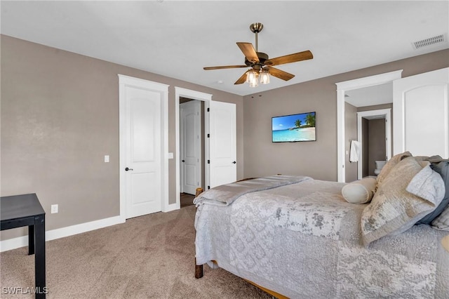 carpeted bedroom featuring ceiling fan