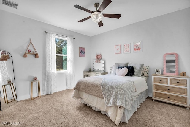 carpeted bedroom with ceiling fan