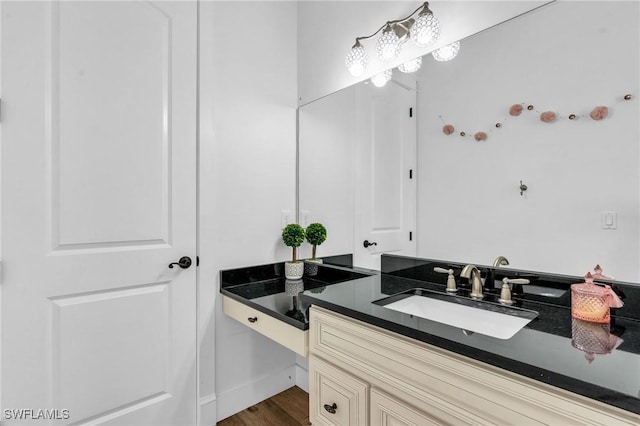 bathroom featuring vanity and hardwood / wood-style floors