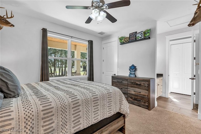 bedroom featuring ceiling fan and light hardwood / wood-style floors