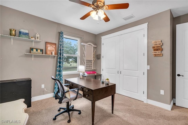 home office with light colored carpet and ceiling fan