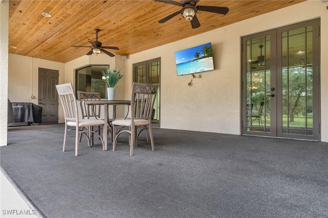 view of patio / terrace with ceiling fan and french doors