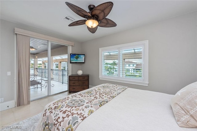 bedroom with light tile patterned floors, access to exterior, and ceiling fan