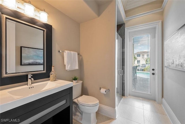 bathroom featuring vanity, tile patterned flooring, and toilet