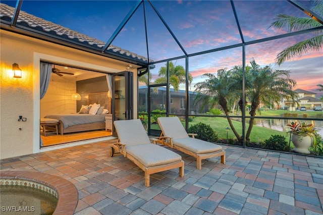 patio terrace at dusk with a lanai