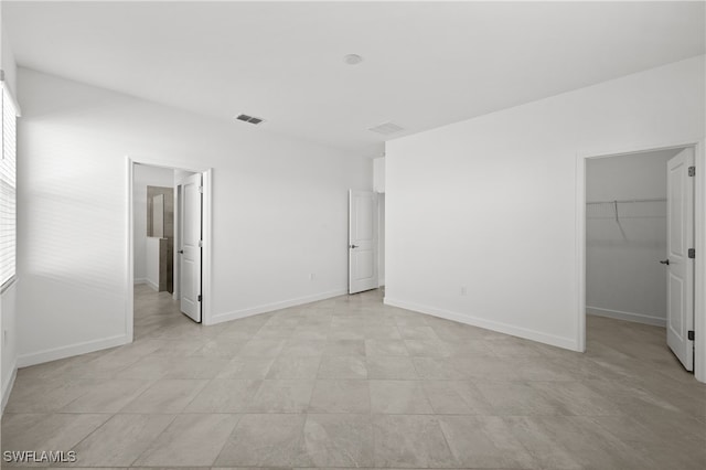 spare room featuring a wealth of natural light