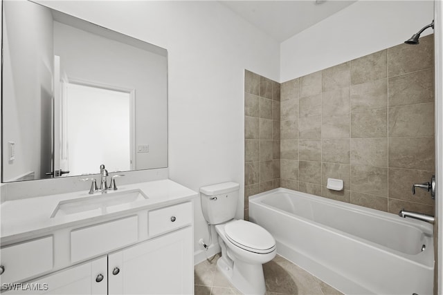 full bathroom featuring vanity, tile patterned floors, toilet, and tiled shower / bath