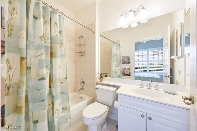 full bathroom featuring vanity, toilet, and shower / bath combo with shower curtain