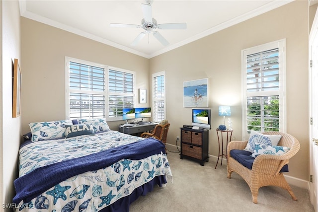 carpeted bedroom featuring ornamental molding and ceiling fan