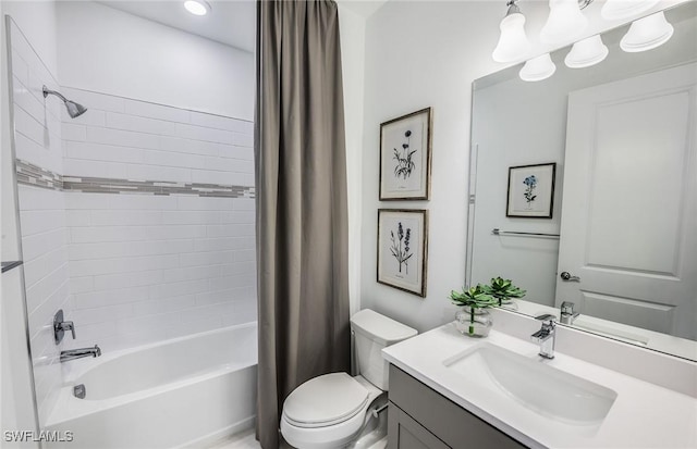 full bathroom featuring vanity, shower / tub combo, and toilet