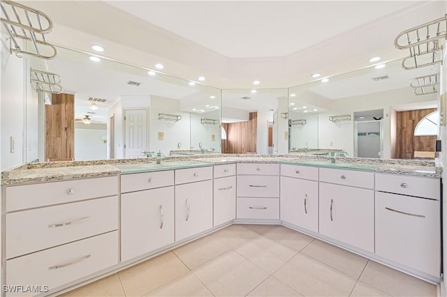 bathroom featuring an enclosed shower, vanity, tile patterned floors, and ceiling fan